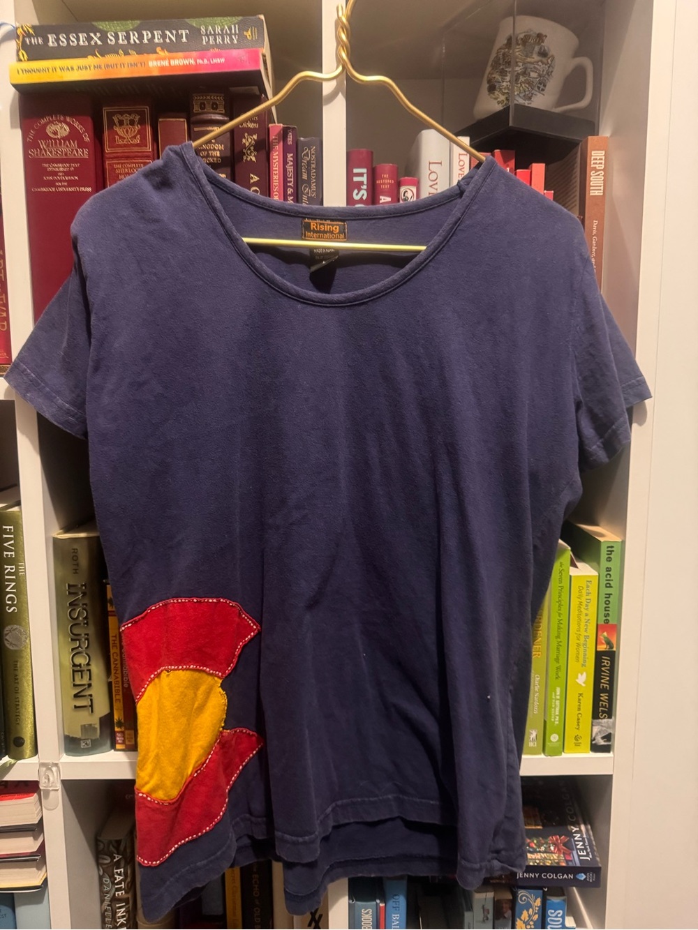 Rising International Navy Tee with Orange Logo Tag